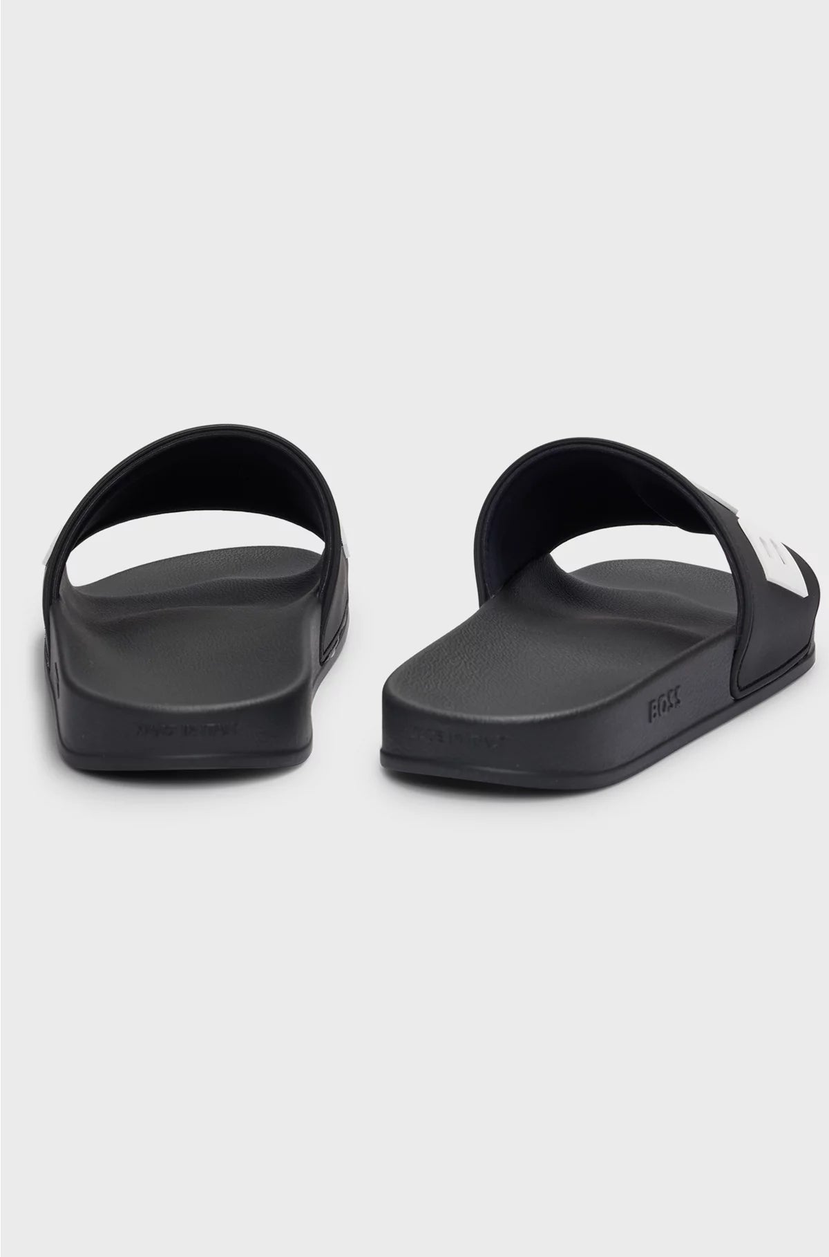 ITALIAN-MADE SLIDES WITH RAISED LOGO