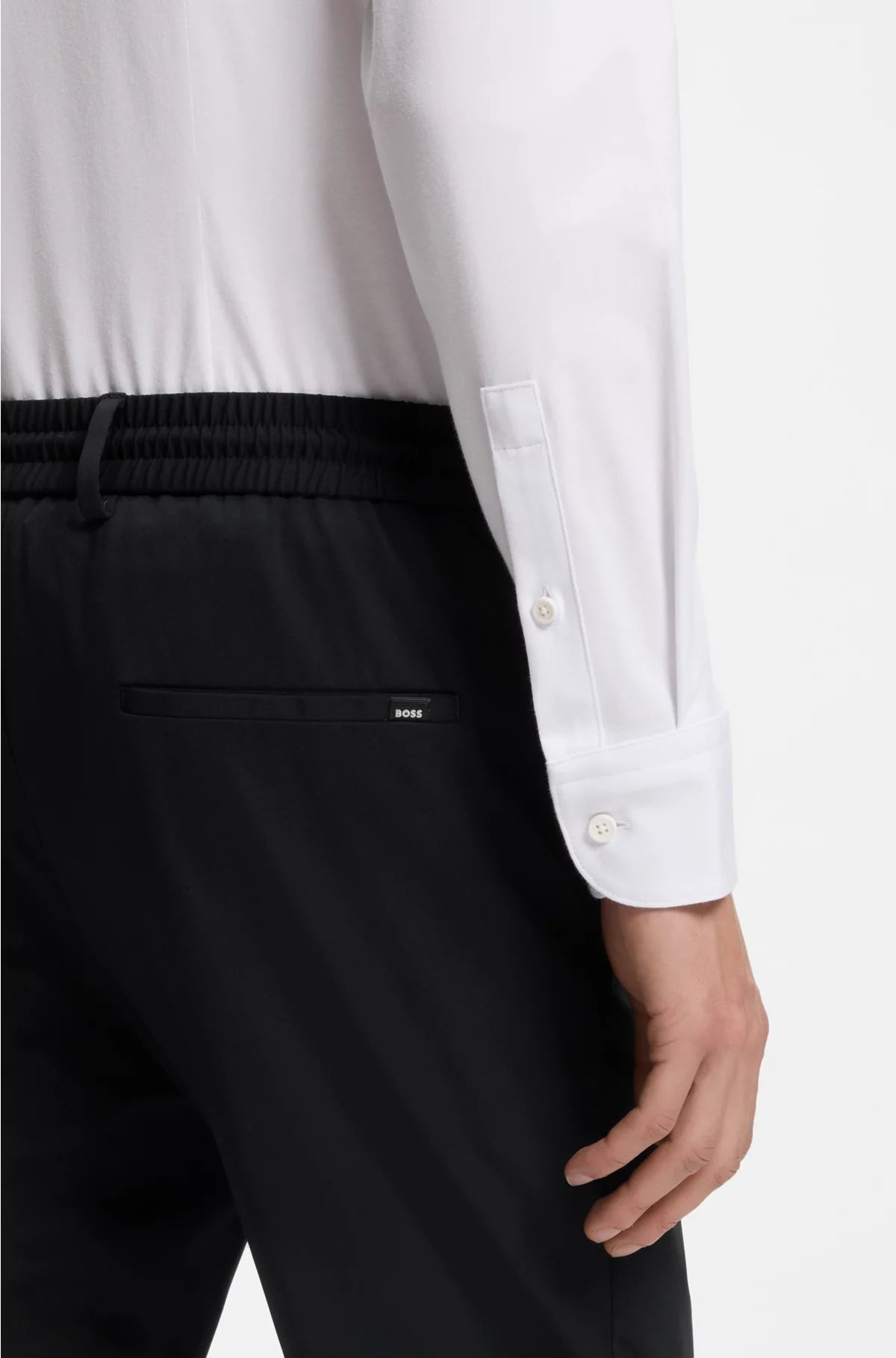 SLIM-FIT TROUSERS IN PERFORMANCE-STRETCH JERSEY